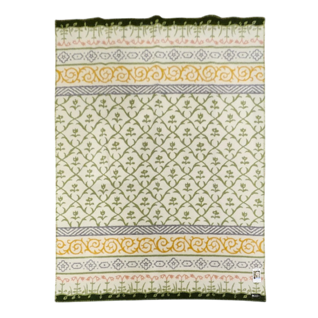 Rectangular Norwegian lambswool blanket featuring green, yellow, and pink floral and geometric patterns on a white background with a dark green border.