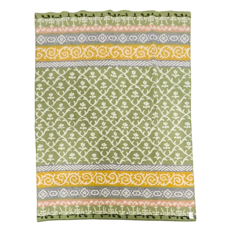 Green Norwegian lambswool blanket with horizontal stripes featuring white, yellow, and gray floral and geometric patterns.