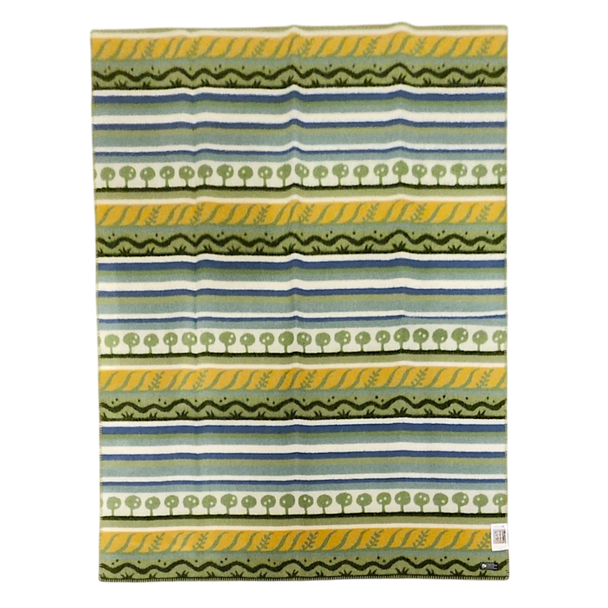 Rectangular Swedish design fabric with horizontal green, blue, white, and yellow stripes, tree and wavy patterns, and a small white tag at the bottom right corner.