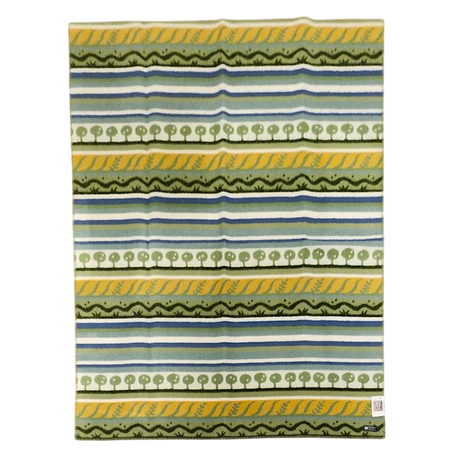 Rectangular Swedish design fabric with horizontal green, blue, white, and yellow stripes, tree and wavy patterns, and a small white tag at the bottom right corner.