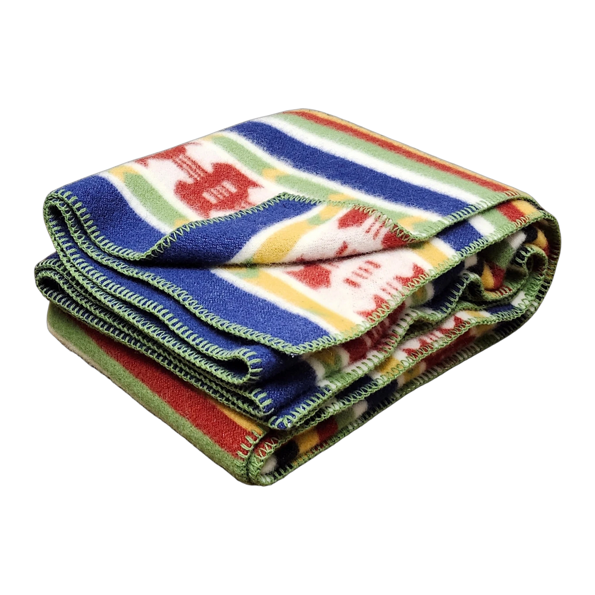 Folded wool blanket with colorful stripes and geometric patterns, green stitching along the edges. Scandinavian design elements visible.