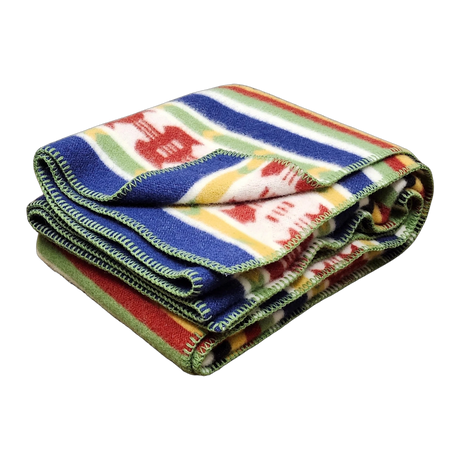 Folded wool blanket with colorful stripes and geometric patterns, green stitching along the edges. Scandinavian design elements visible.