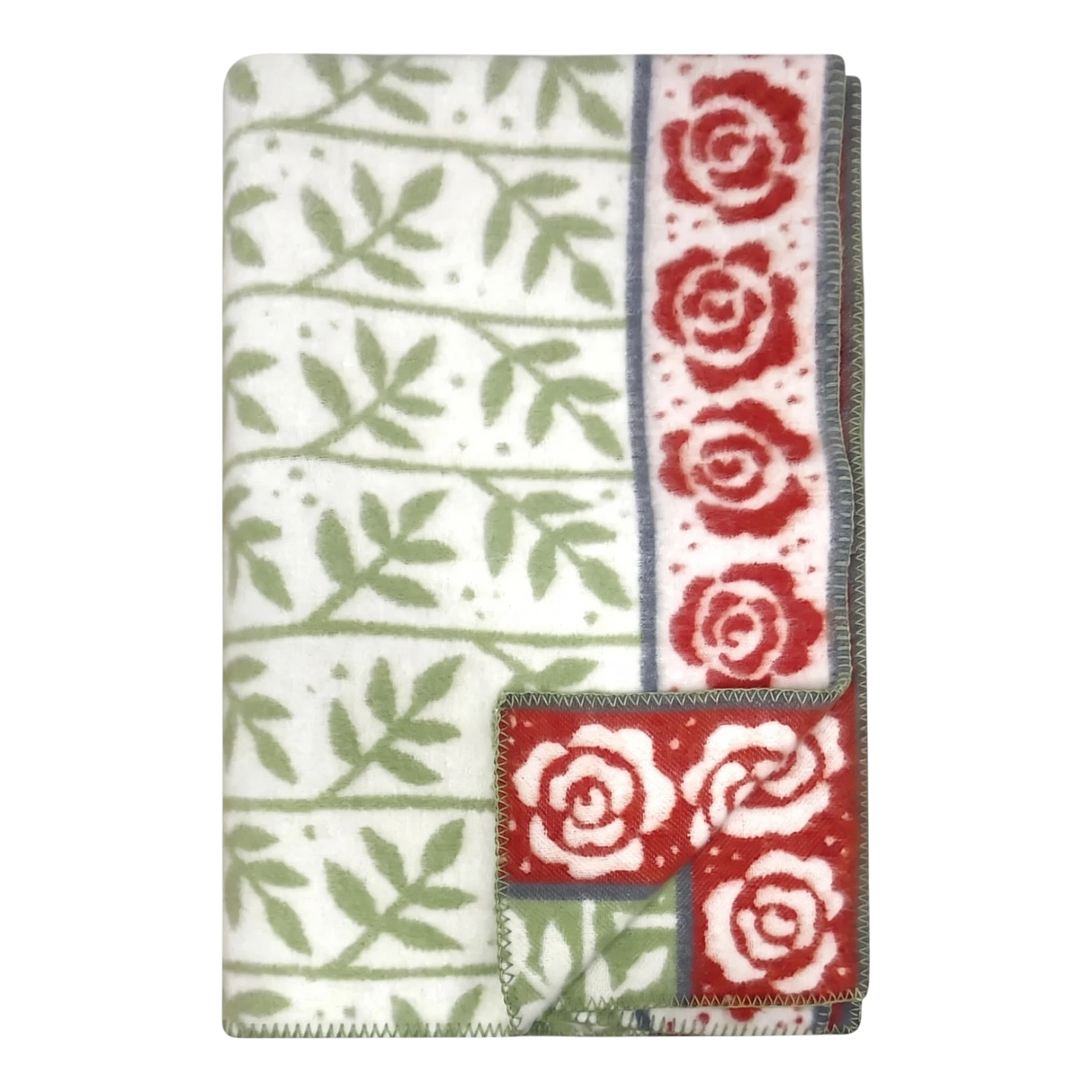 Swedish design blanket featuring green leaf pattern and red rose border on white background; one corner flipped to show reverse side.