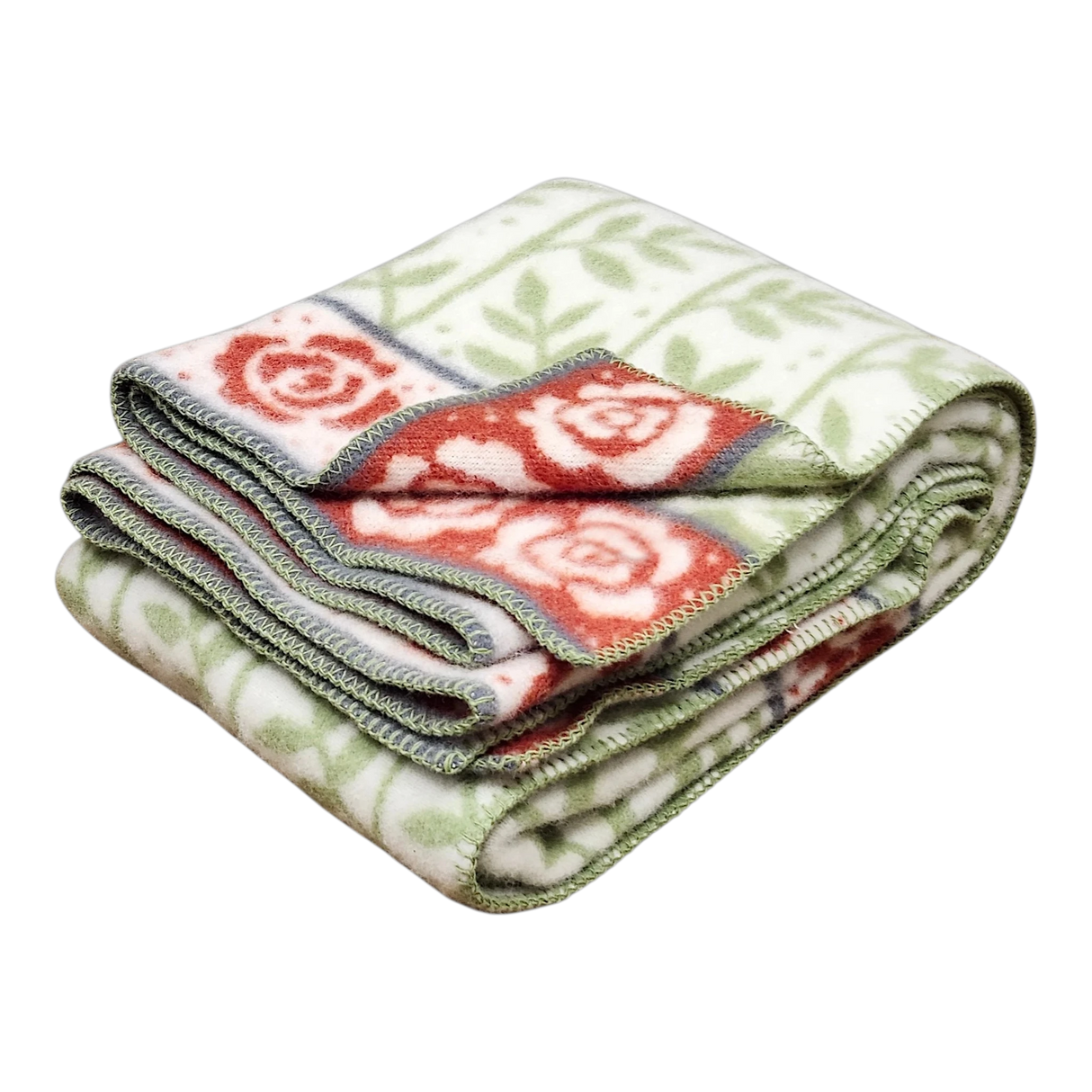 Swedish design blanket with green leaf pattern, red rose-bordered edging, and green and white stitched trim.