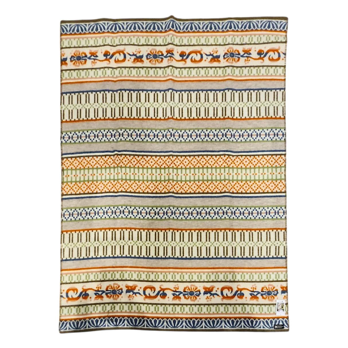 Rectangular lambswool blanket with horizontal orange, black, and beige stripes, showing Swedish folk art-inspired geometric and floral patterns.