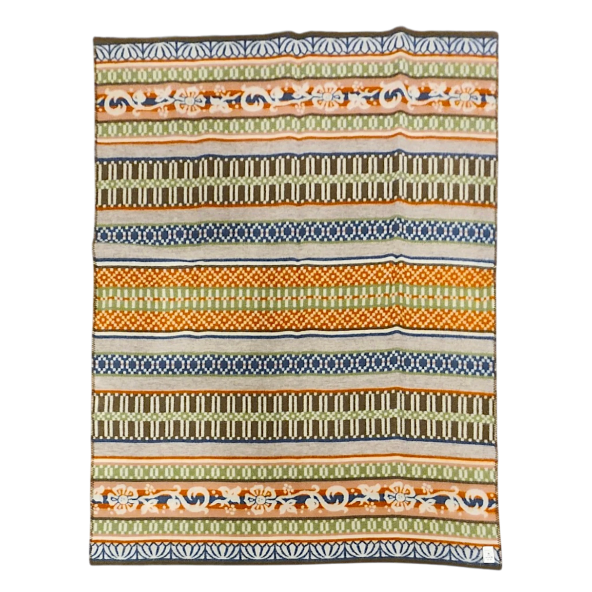 Rectangular wool blanket with horizontal green, brown, orange, and blue stripes, featuring geometric and floral patterns. Fabric is slightly wrinkled.