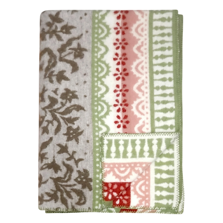 Folded lambswool blanket featuring gray, green, red, and white floral and geometric patterns on a light surface.