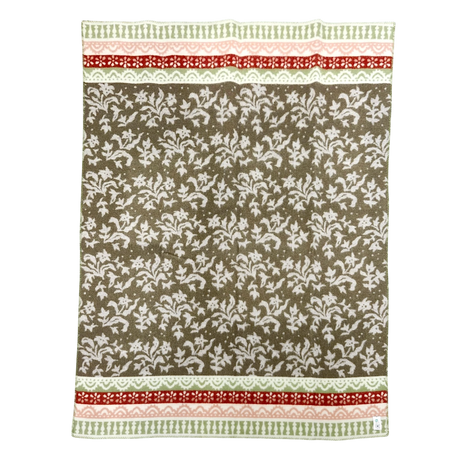 Rectangular lambswool blanket with a brown floral pattern and red and green decorative stripes along the top and bottom edges.