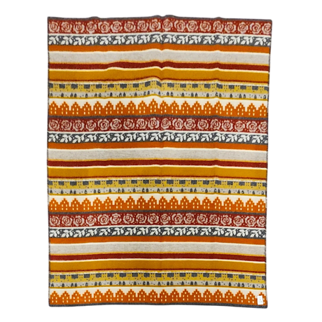 Woven Swedish blanket with orange, yellow, gray, and white horizontal stripes and alternating rows of floral and geometric patterns.