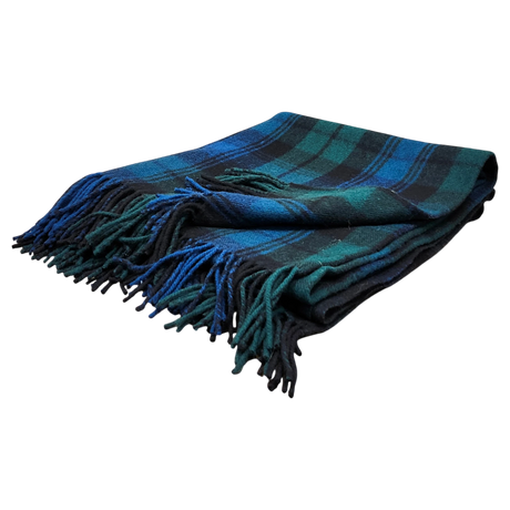 Folded Black Watch tartan blanket featuring blue, green, and black stripes with fringe on the edges, shown on a white background.