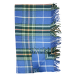 Folded Highland tartan blanket with green, white, and yellow stripes and fringed edges on a white background.