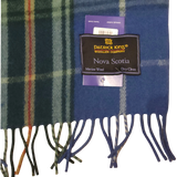 Blue and green Scottish tartan scarf with fringe, featuring a label that reads Patrick King Woollen Company, Nova Scotia, Merino Wool, and Dry clean only.