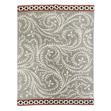 Gray and white wool blanket featuring swirling vine patterns, finished with a geometric border in black, white, and red.