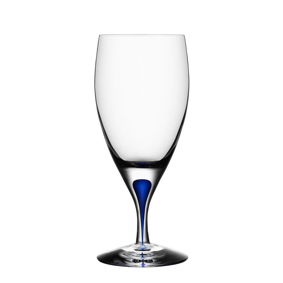 The Orrefors Intermezzo Blue Iced Beverage Glass, 15oz, is a clear glass goblet featuring Erika Lagerbielkes signature blue detailing on the stem and base against a plain white background.