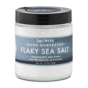 A 3.17oz (90g) glass jar of Saltverk Hand Harvested Flaky Sea Salt, sustainably sourced from the Westfjords of Iceland.