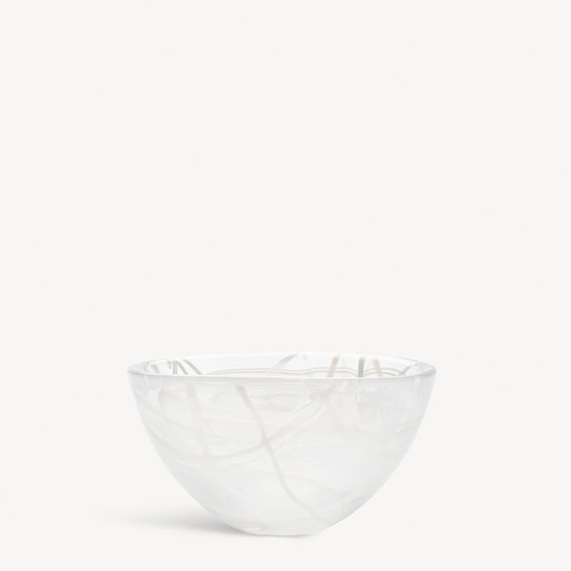 A KostaBoda Contrast Bowl by Anna Ehrner, featuring white glass with blue and black veining, shown against a plain white background.