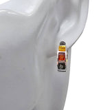 Multicolor 3 amber stones (yellow, red, gray) set in .925 sterling silver hoop earrings elegantly displayed on a white mannequin ear.