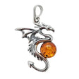 The Pendant: Cognac Amber Silver Dragon Pendant features a dragon clutching a round Cognac Amber gemstone, inspired by mythical tales.
