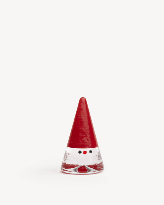 Clear glass gnome figurine with a tall red conical hat, a red nose, and two black dot eyes.