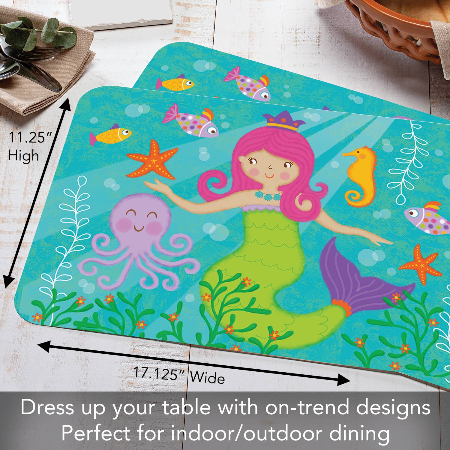 The Kids Mermaid Reversible Rectangular Plastic Placemat makes an excellent housewarming gift, featuring a vivid design of a colorful mermaid with pink hair surrounded by a seahorse, octopus, and starfish. With dimensions of 11.25 x 17.25 inches, this versatile placemat is suitable for both indoor and outdoor dining. It is easy to care for and BPA-free, ensuring stress-free use.