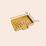 Rectangular bamboo tray with curved grooves on top, measuring 5 inches wide by 3.5 inches deep, shown from above against a plain background.