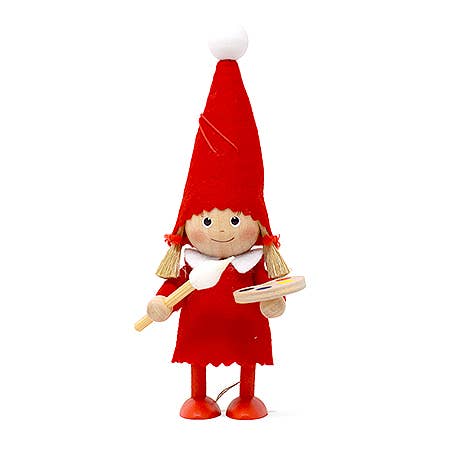 The Scandinavian Girl Painter figurine features a character in a red outfit and hat, expertly handcrafted, each hand holding a wooden item. Ideal for adding festive charm to your holiday decor.