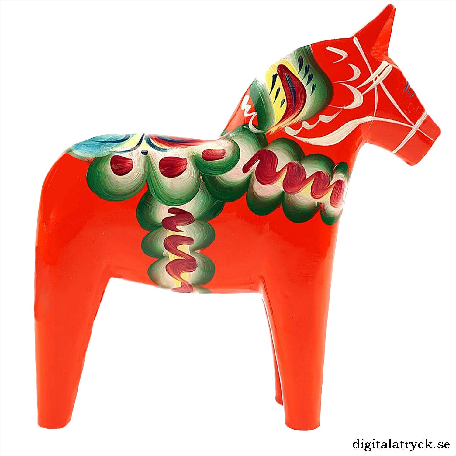 A vibrant Swedish Red Dala horse, featuring green and white floral patterns and facing right, is beautifully complemented by an eco-friendly dishcloth designed to be biodegradable and gentle on the environment.