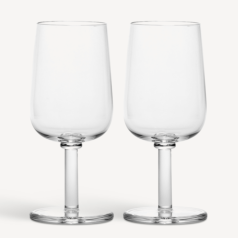 Two empty KostaBoda Viva All Purpose Glass Medium wine glasses (2-pack) with short stems are placed side by side on a white background.