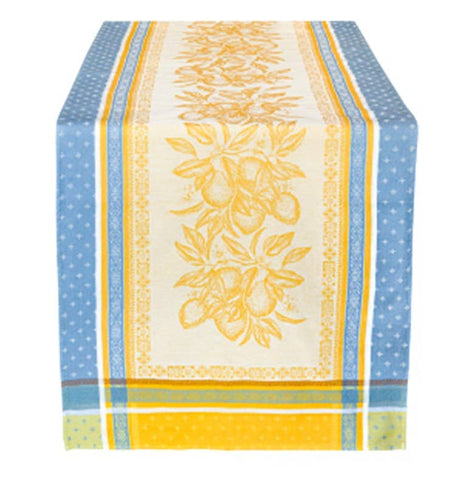 Cotton table runner with yellow and blue stripes, a central pattern of yellow flowers and lemons on a cream background.