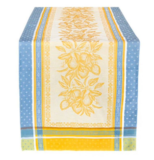 Cotton table runner with yellow and blue stripes, a central pattern of yellow flowers and lemons on a cream background.