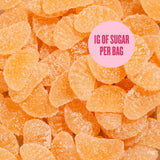 Juicy watermelon gummy candies from PÄNDY are stacked closely together, highlighting a delicious treat that reimagines healthy candy. A pink circle in the corner features the text: “1G OF SUGAR PER BAG.” Product Name: PÄNDY WATERMELON 14 X 50 G Swedish Sugar Free Gummy Candy Brand: Swedish Sweets Wholesale LLC - Swedish Candy.