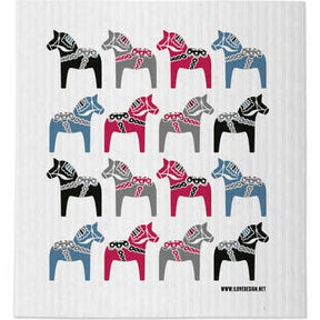 A group of horses on a white surface, evoking the clean freshness of the super absorbent Swedish Dala Horse Multi Colors Dish Cloth—an environmentally-friendly towel.