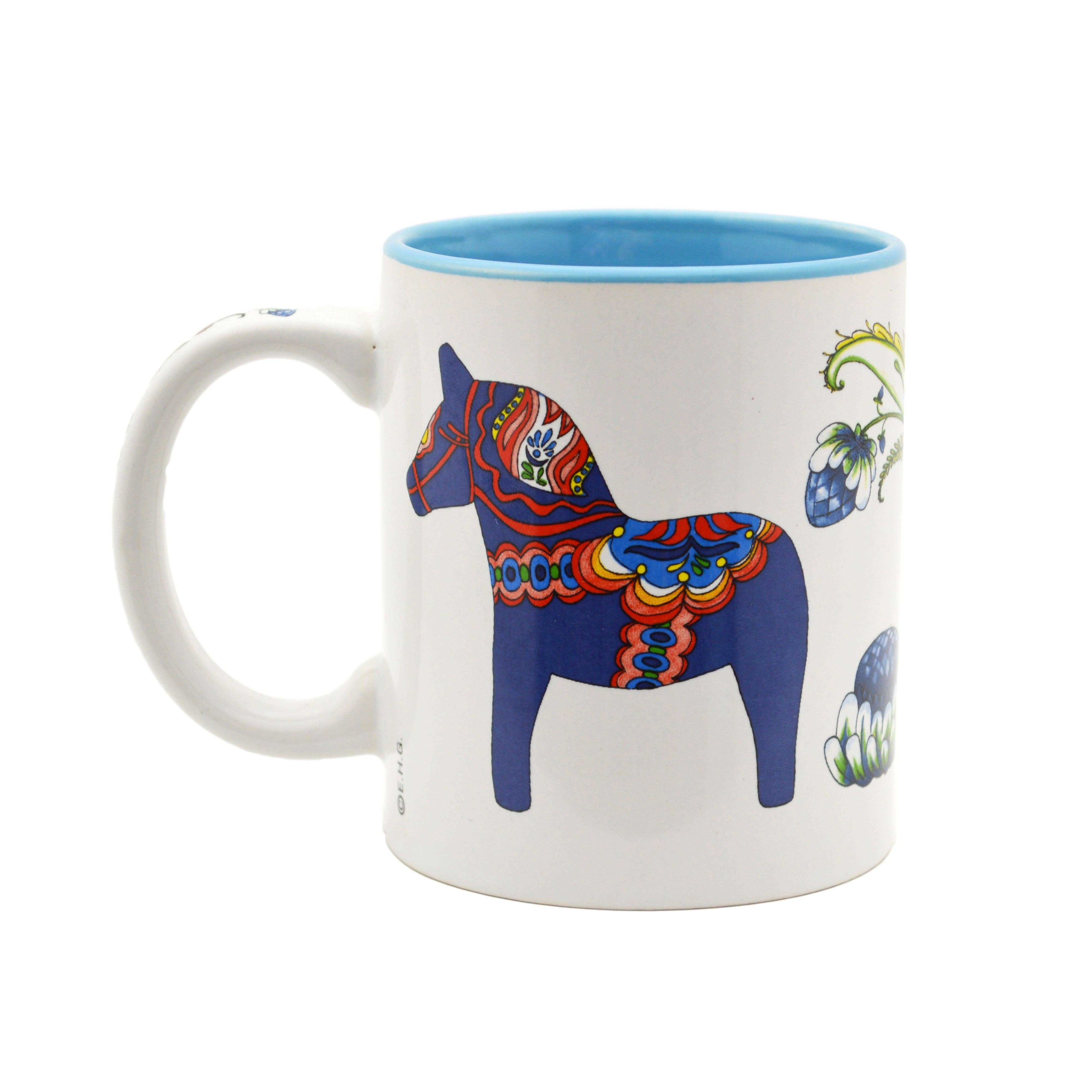 Red Dala Horse Ceramic Coffee Mug with a blue interior, featuring a colorful decorative horse and floral patterns inspired by classic Swedish design. A charming Scandinavian mug for your collection.