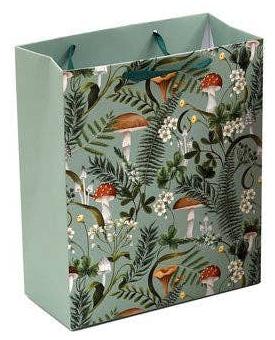 The Forest Mushroom gift bag, available in enchanting red or green hues and measuring 7.5" wide by 9" high by 3.5" deep, features a whimsical nature-themed design with various mushrooms and ferns—ideal for adding a touch of enchantment to your gift wrapping.