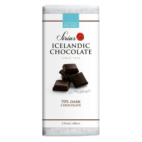 White-wrapped Icelandic chocolate bar featuring 70% dark chocolate and sea salt, with images of chocolate squares and salt crystals on the packaging.