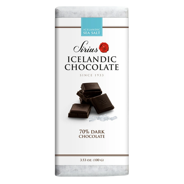 White-wrapped Icelandic chocolate bar featuring 70% dark chocolate and sea salt, with images of chocolate squares and salt crystals on the packaging.