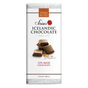 Icelandic milk chocolate bar with toffee and sea salt, shown with chocolate pieces and visible salt crystals. Label displays 33% milk chocolate and net weight 3.53 oz.