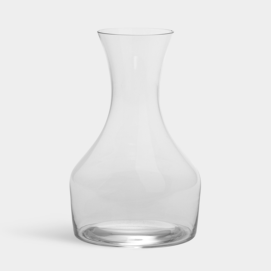 The Orrefors Share Carafe Large 41.5oz features a wide base and narrow neck, elegantly designed for beauty and function. It is dishwasher safe for easy cleaning and showcased against a plain white background.