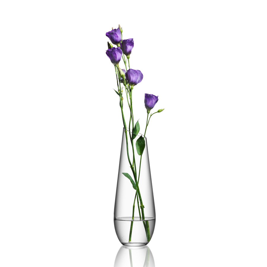 The Orrefors: Enjoy Carafe 27oz by Erika Lagerbielke features vibrant purple flowers against a pristine white background.