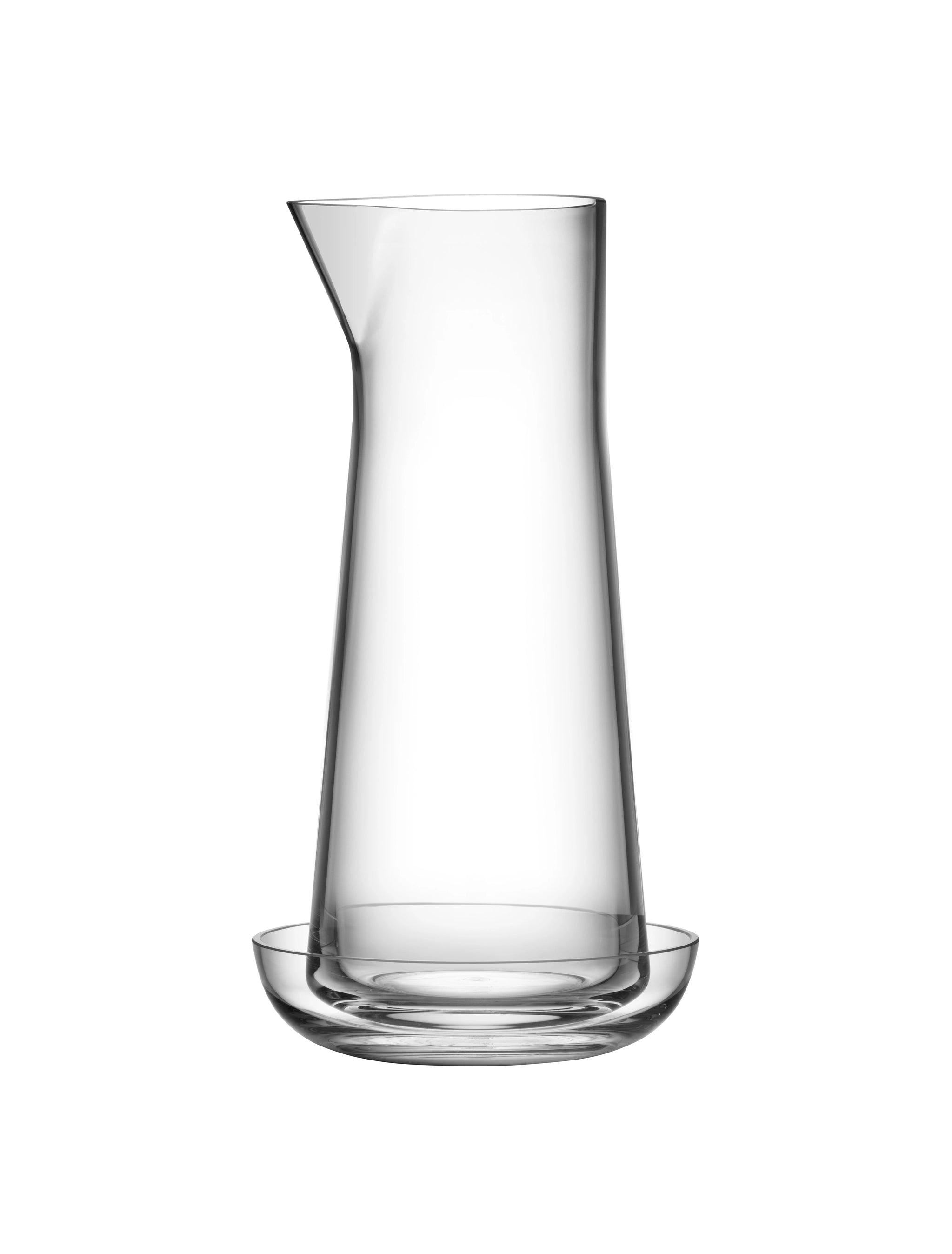 An Orrefors: Informal Clear Carafe with Bowl 34oz elegantly rests on a matching round glass tray, reflecting Björn Dahlströms modern design style.