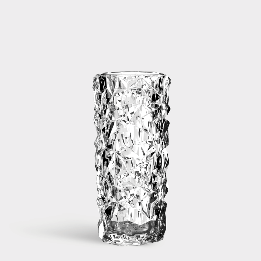 A tall, clear Orrefors: Carat Vase Small with a textured, geometric pattern stands upright on a plain white background.