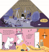In the Book: In the Moominhouse A lift-the-flap Moomin Story Board Book from Swedish Gift Store, an illustrated scene features Moomintroll and Snorkmaiden playing with a hanging trapeze in a cozy room of the iconic Moominhouse, while the attic above is filled with suitcases, boxes, and old furniture. Whimsical text and musical notes evoke Tove Jansson’s enchanting world.