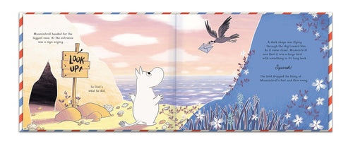 An illustrated page from the book "Moomin Mail: A Magical Moomin Adventure, Full of Interactive Fun" shows Moomintroll standing by a Look Up sign on the beach. A bird clutching an envelope suggests a treasure hunt, and the scene is adorned with purple and white flowers.