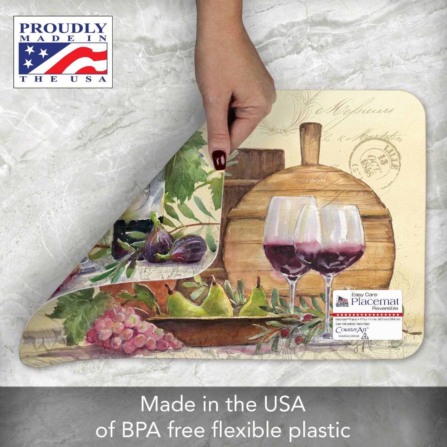 A hand lifts the "Rustic Wine Reversible Rectangular Plastic Placemat," made from BPA-free flexible plastic and proudly crafted in the USA, ideal for enhancing your table setting with a rustic wine charm.