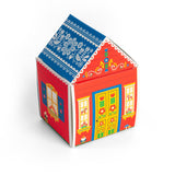 Small house-shaped box with red walls, blue roof, and visible folk art patterns; Nordic-themed design.
