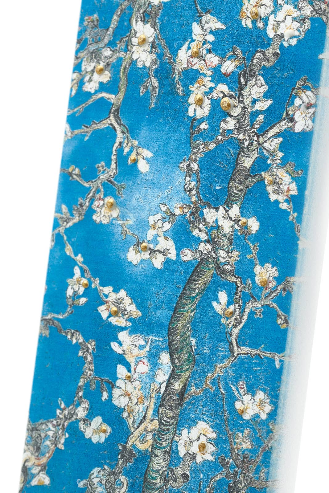 Close-up of the Candle: Van Gogh Almond Blossom - Flat Candle, showcasing a pattern of blossoming branches against a blue background, reminiscent of Van Gogh's Almond Blossom.