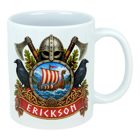 White mug featuring a Norse crest with axes, a Viking helmet, two black birds, a ship on water, and “ERICKSON” in bold red letters below the design.
