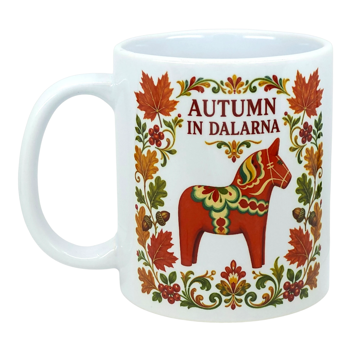 White mug featuring colorful floral patterns, a red Swedish Dala horse, and “AUTUMN IN DALARNA” text encircled by autumn leaves in Scandinavian folk art style.