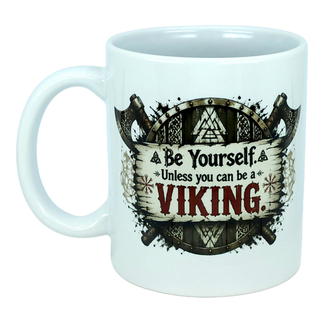 Introducing the Mug: Be Yourself Unless You Can Be A Viking Ceramic Mug (11 oz Capacity) from Nordic Wholesale. This ceramic coffee mug features a bold Viking-themed design with crossed axes and runes. The text reads: "Be Yourself. Unless you can be a Viking," with "Viking" highlighted in large, bold letters. Perfect for Norse mythology enthusiasts or anyone looking for a striking Nordic warrior gift, this mug celebrates your love of all things Viking in style.
