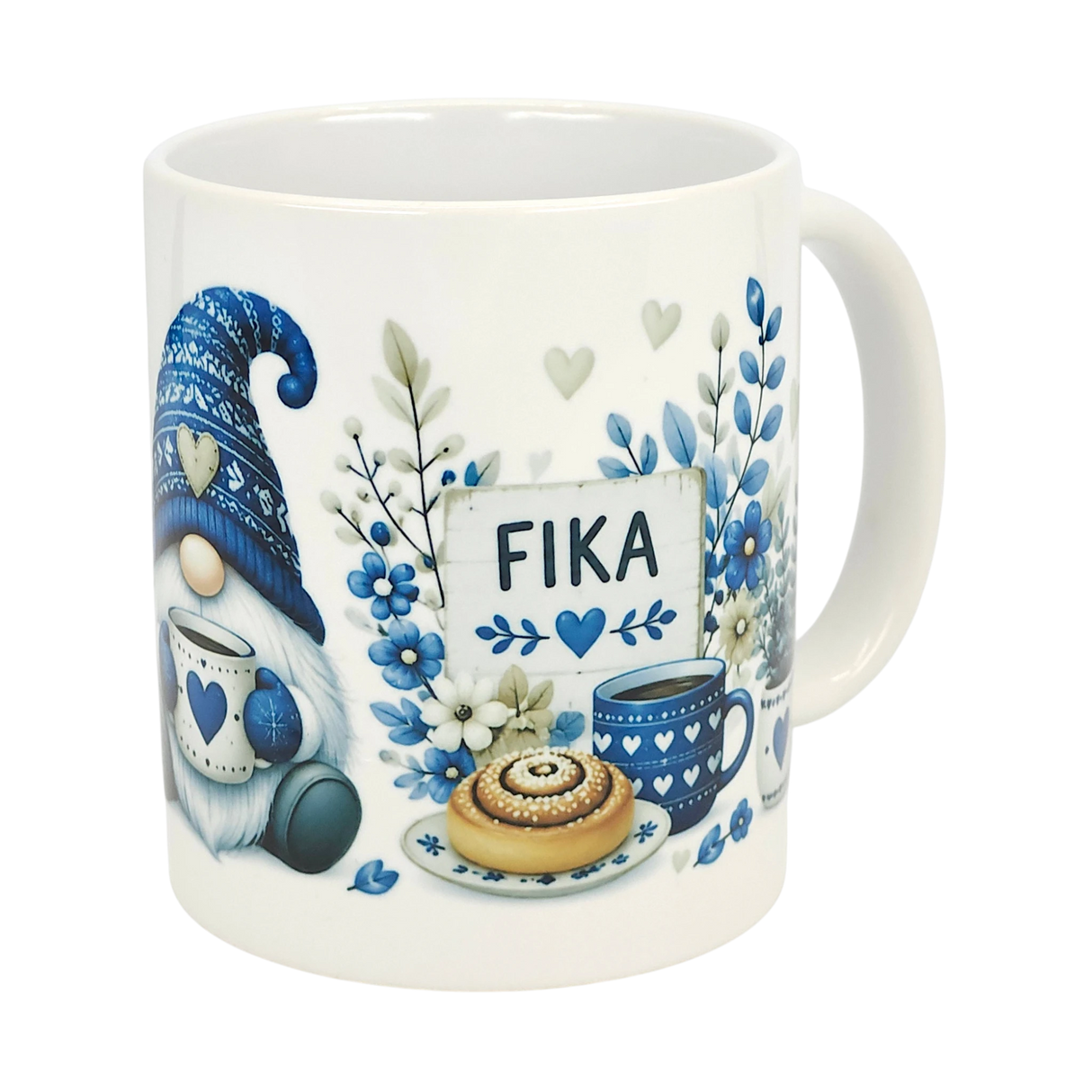 The Nordic Wholesale Mug: Blue Tomte Gnome Fika Ceramic Mug (11 oz) features a blue-and-white Scandinavian gnome with a heart mug, teacup, pastry, flowers, and FIKA sign—all in cozy Swedish coffee cup style.
